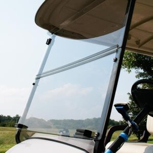 Windshield for Yamaha G29-Drive golf cart with foldable design and clear acrylic panel.