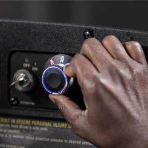 LED-lit rotary switch for forward and reverse control on carts.