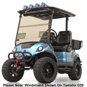 Golf cart with tinted fold-down windshield, off-road tires, and custom accessories for enhanced perf.