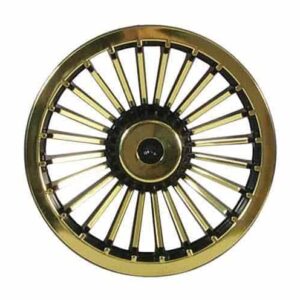Black and gold turbine wheel cover for custom carts and vehicle enhancements.