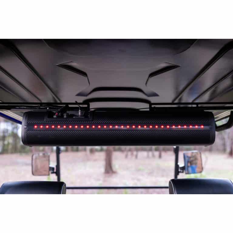 Red LED light bar mounted inside off-road vehicle