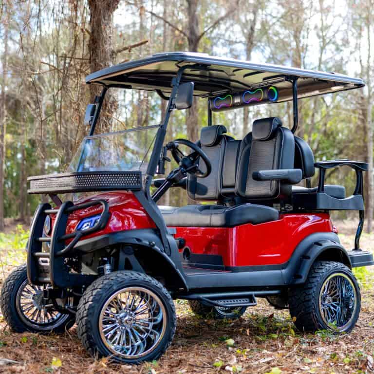 Custom red lifted golf cart with speakers