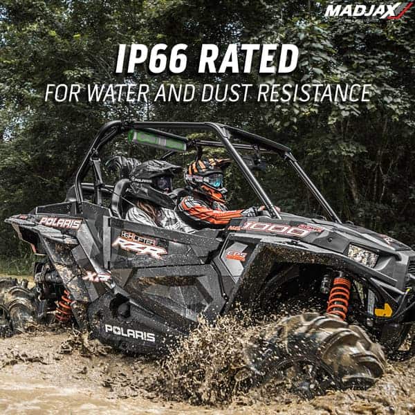 Off-road vehicle splashing through mud, IP66 rated