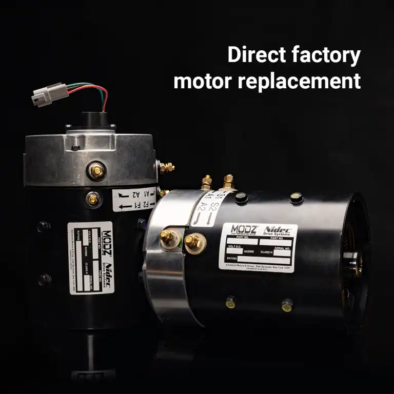 Two industrial electric motors on black background