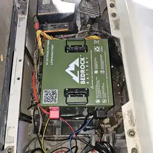 Bedrock LiFePO4 battery installed in vehicle compartment